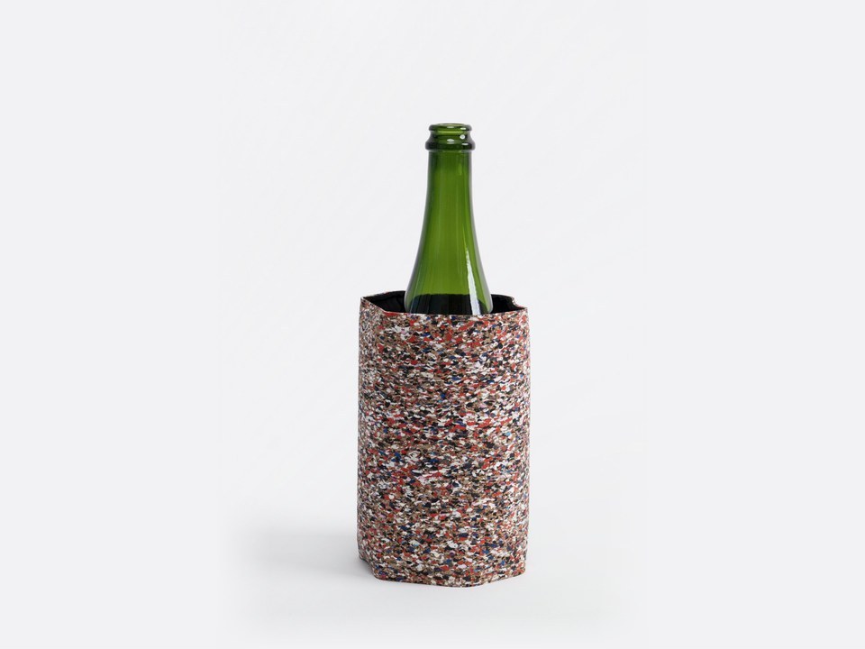 The Wine Cooler EVA in red flecks wrapped around a green bottle.
